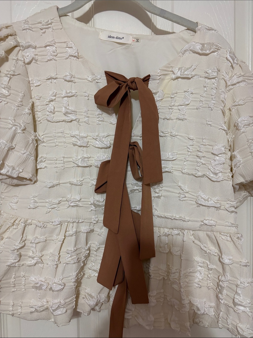 idem ditto Cream Textured Peplum Blouse with Brown Bow Tie
